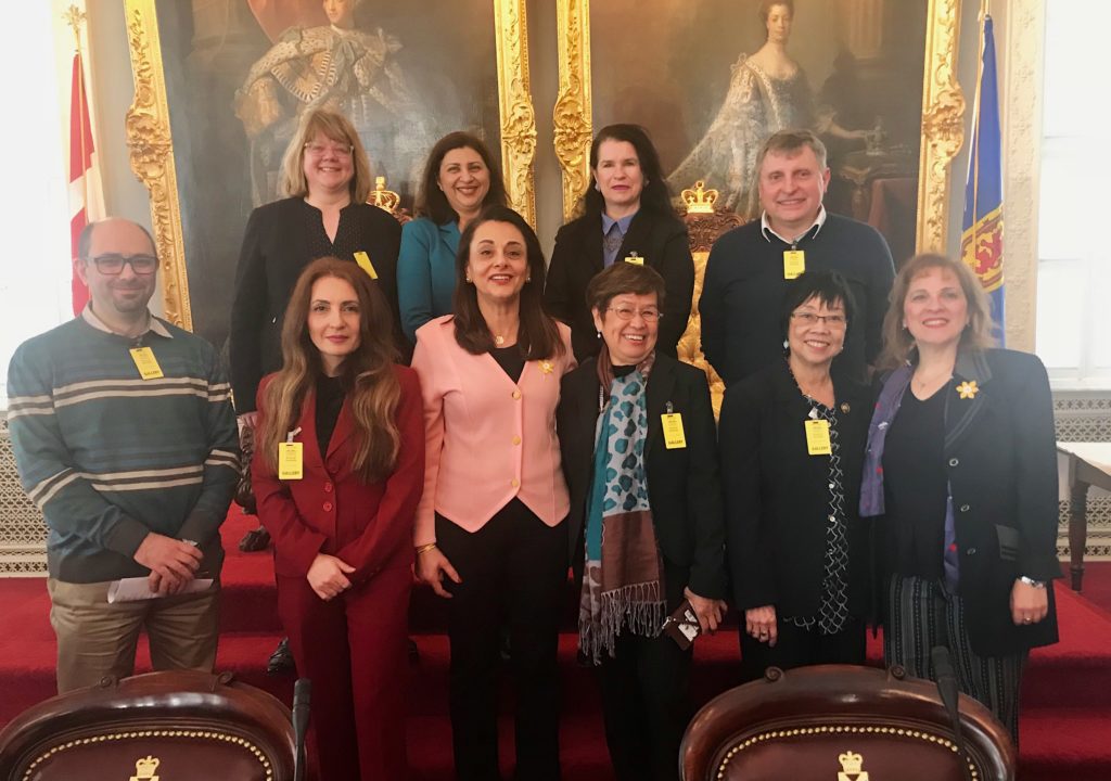 Minister of Immigration Lena Diab and MLA for Clayton Park West Rafah DiCostanzo with the members of the Nova Scotia Coalition on Community Interpreting at the Province House