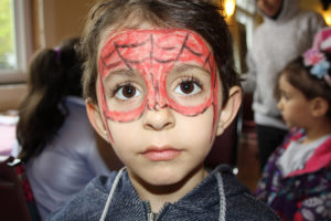 Boy with face painted