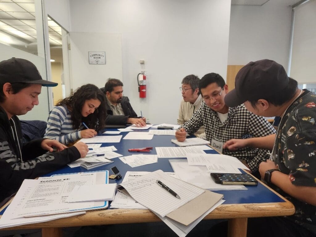 newcomers discussing with each other during the Conversation Circle program