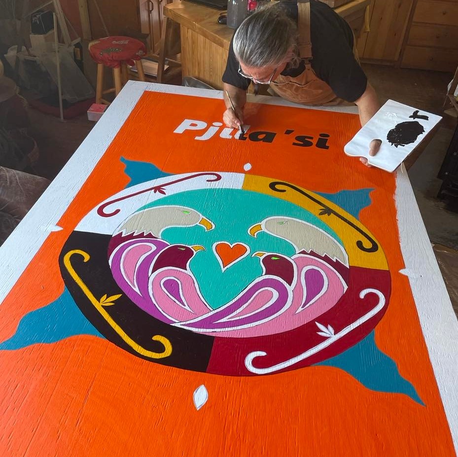 Lorne Julien working on his mural Mi'kmaki