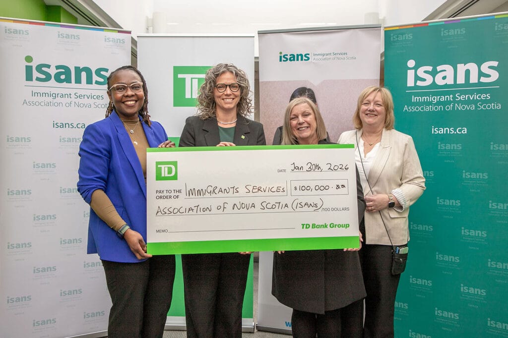 TD cheque presentation with senior leadership team