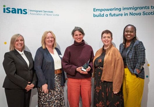 Hillary Lindsay receiving ISANS award for 2026