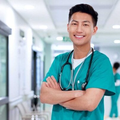 A smiling Asian man who works as a nurse