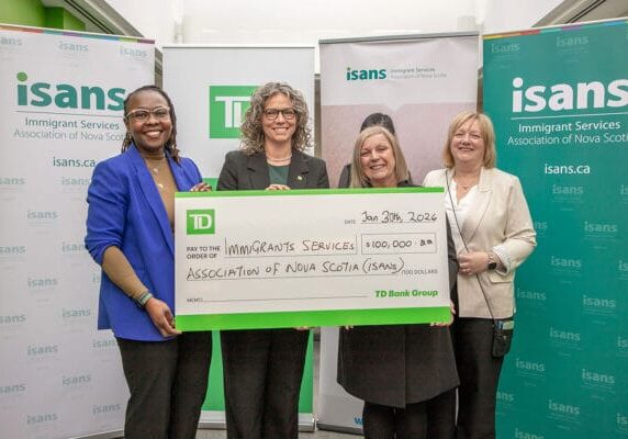 TD cheque presentation with senior leadership team