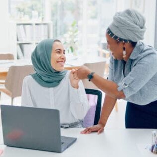 New comer women in office learning and working together