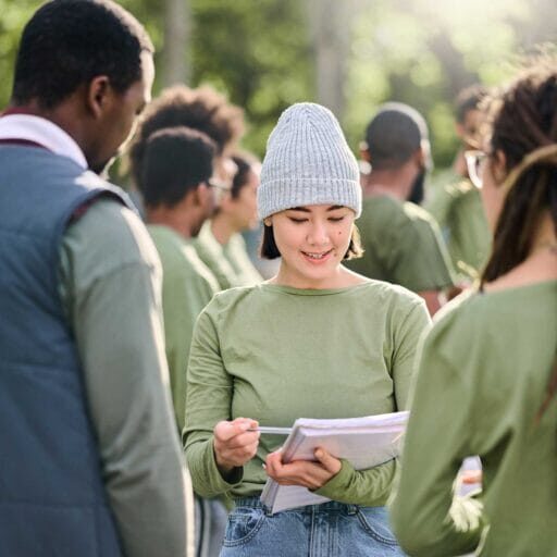 A newcomer immigrant engaging in a welcoming community during an event